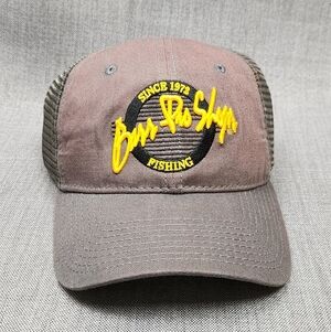 The Game Bass Pro Shops Fishing Adjustable Curved Bill Hat.